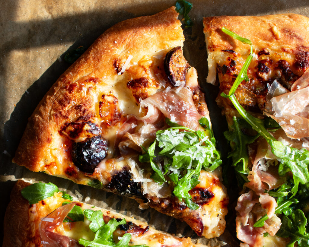 finished Fig & Prosciutto Pizza with arugula